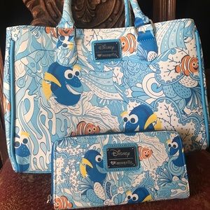 Brand new Disney lounge-fly Nemo purse and wallet.